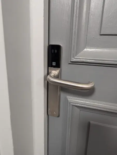Door with DOM Wireless door handle integrated with Sensor Access GuardPoint10 access control software