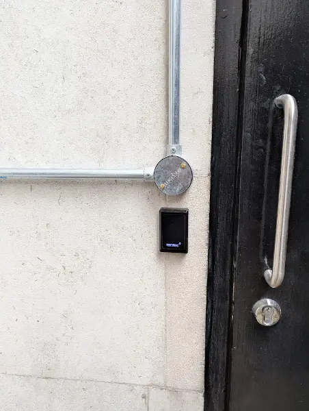 Sensor Access DF-Mini Reader installed on exterior door